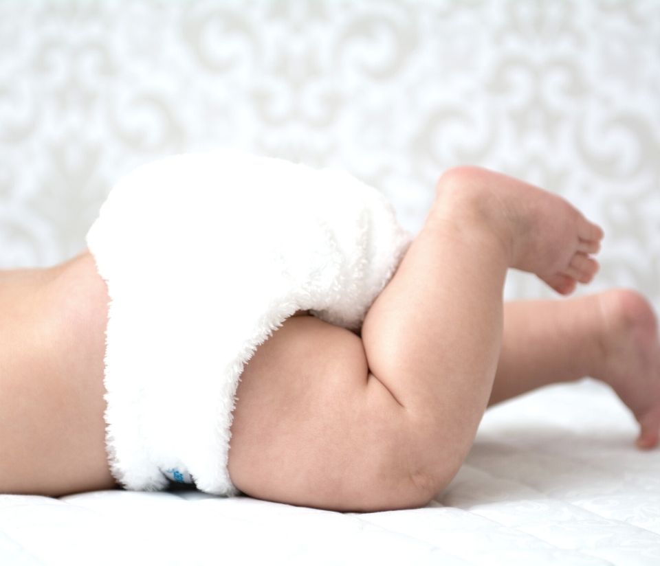 Ethical nappies, a reusable nappy on a baby